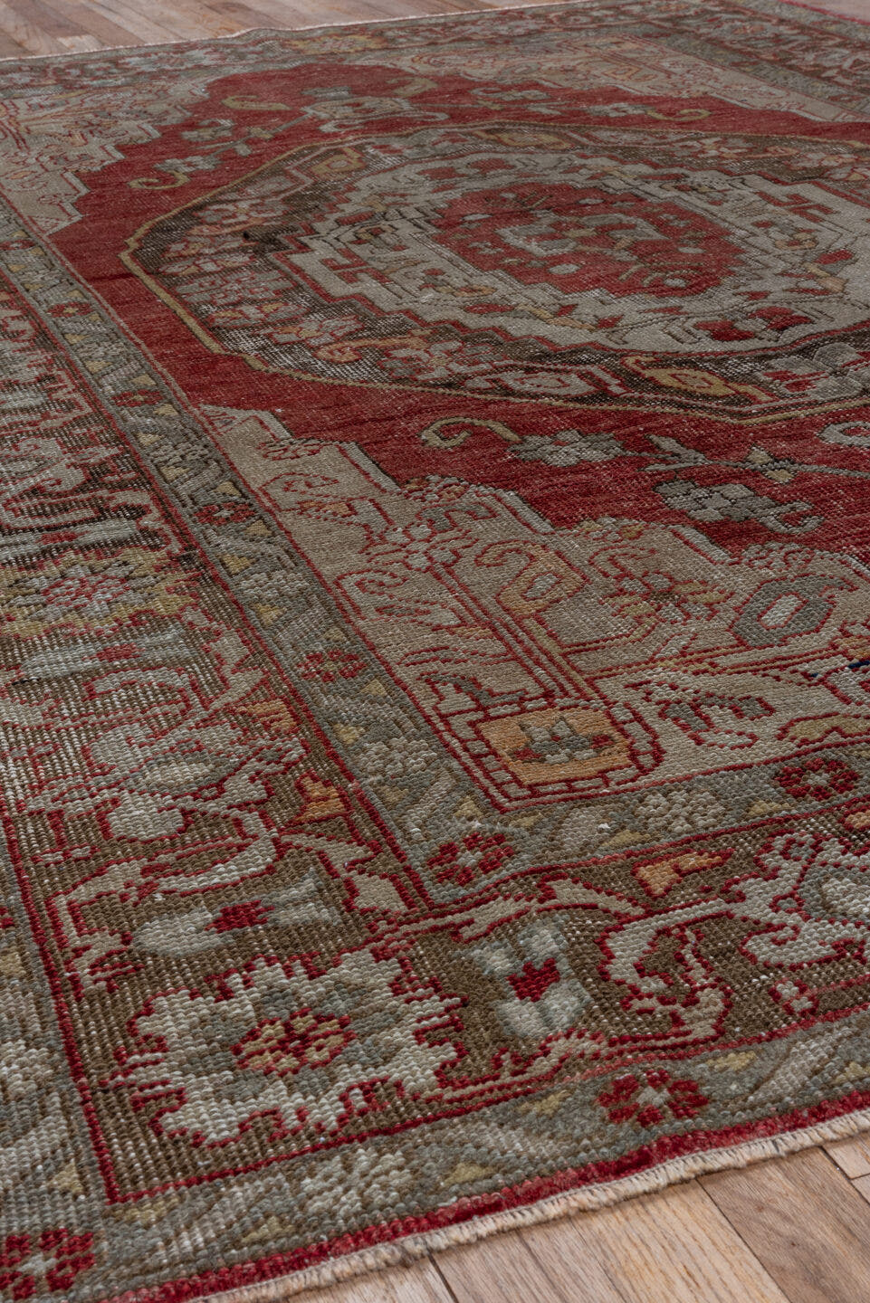 5' x 8' one-of-a-kind handmade vintage Oushak medium size rug. Color palette: red, ivory, taupe, rose, brown, sage, beige