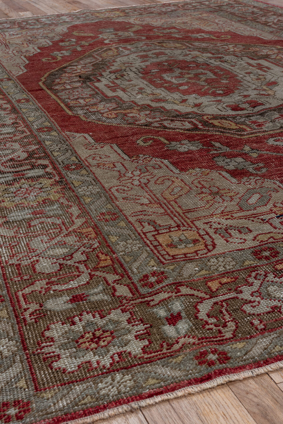 5' x 8' one-of-a-kind handmade vintage Oushak medium size rug. Color palette: red, ivory, taupe, rose, brown, sage, beige