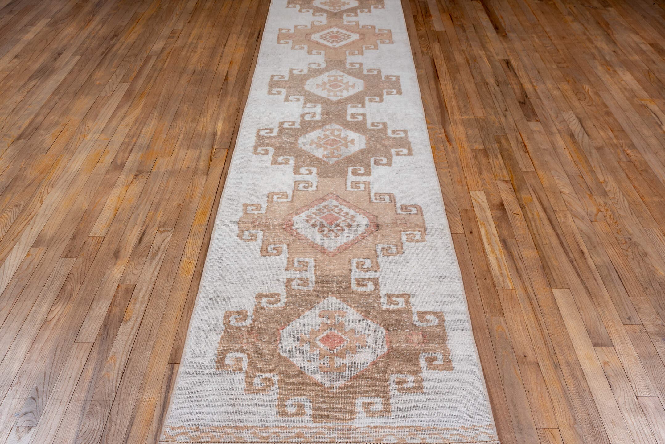 2' x 12' one-of-a-kind handmade vintage Oushak runner rug. Color palette: ivory, taupe, blush, beige, gray, pink
