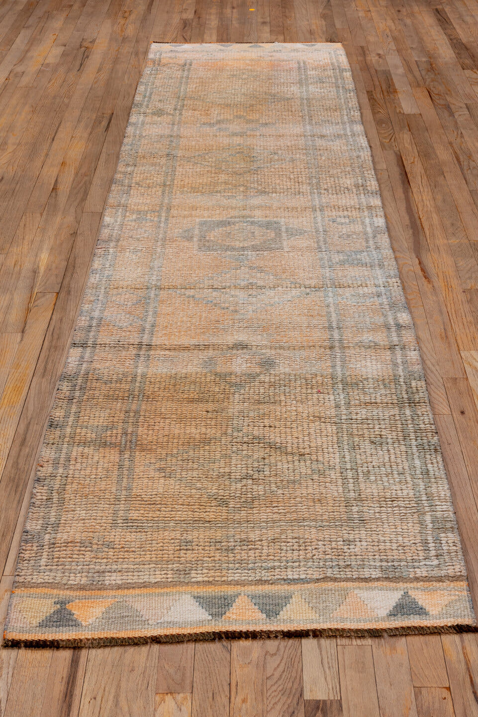 2' x 11' one-of-a-kind handmade vintage Oushak runner rug. Color palette: peach, gray, ivory, taupe, camel, terracotta, pink