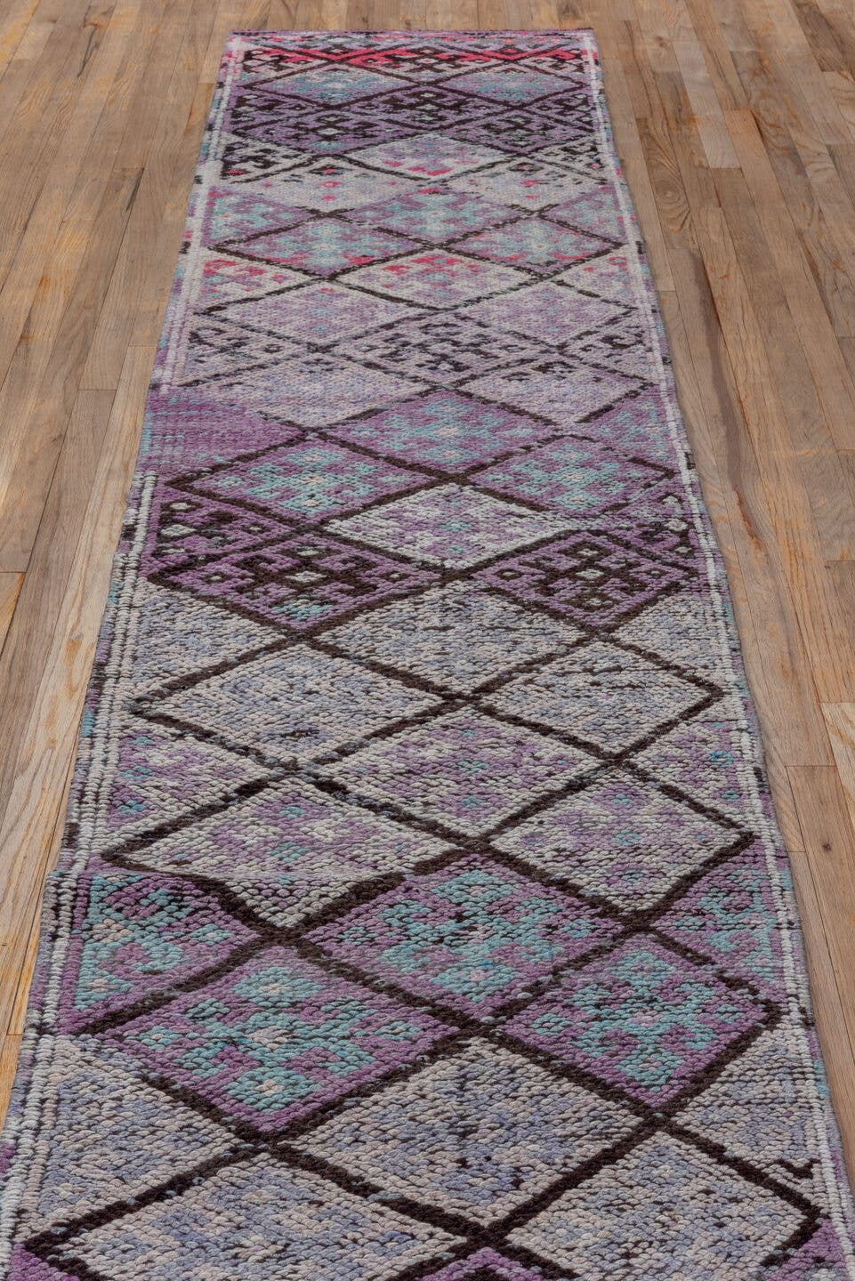 2' x 11' one-of-a-kind handmade vintage Oushak runner rug. Color palette: lavender, plum, ivory, aqua, rose, charcoal