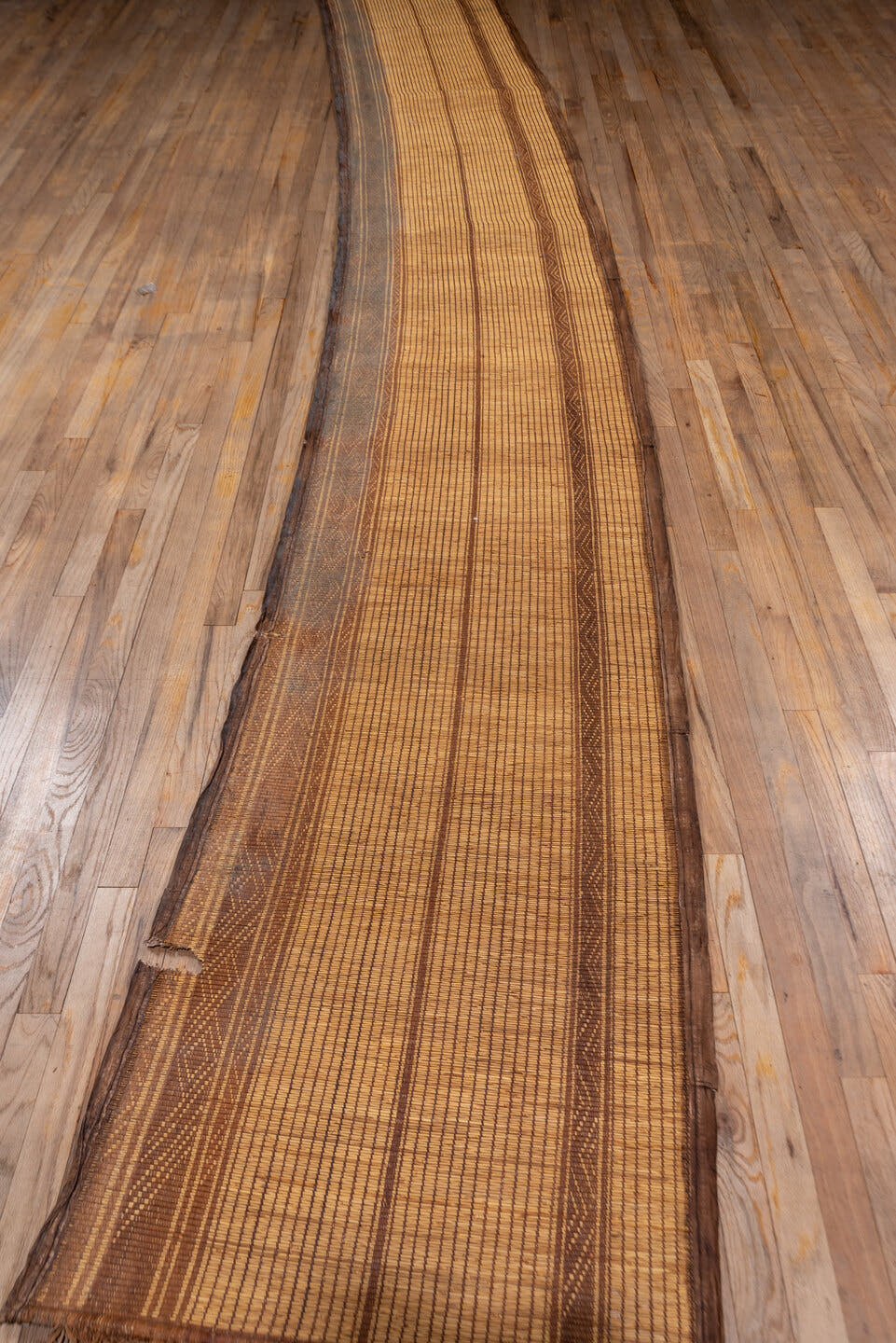 2' x 17' one-of-a-kind handmade vintage Tuareg runner rug. Color palette: camel, brown, tan, beige