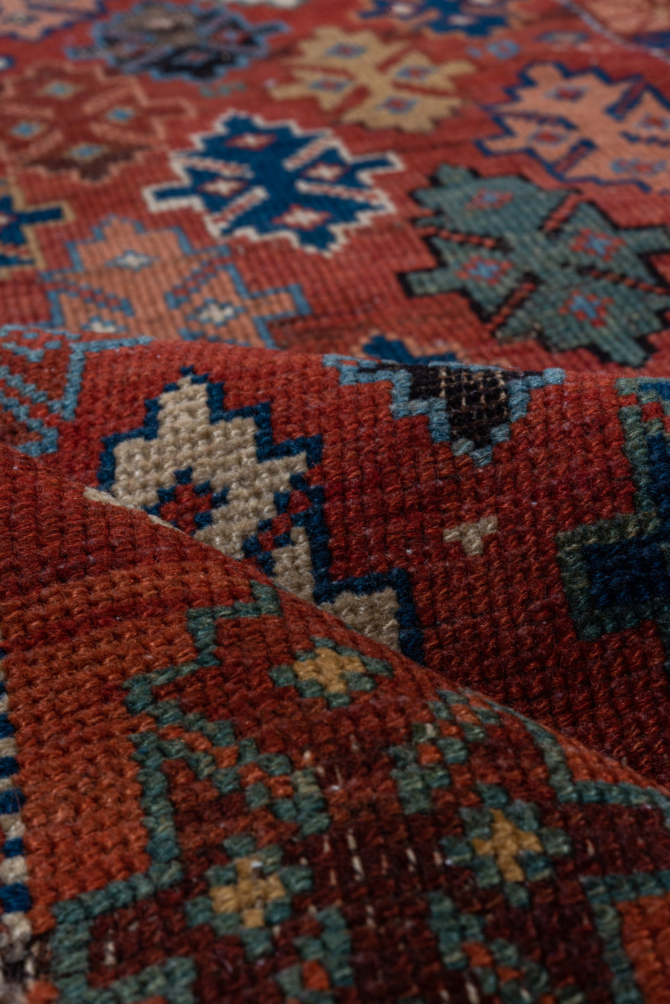 2' x 4' one-of-a-kind handmade vintage Shirvan small size rug. Color palette: black, brown, gray, pink, red