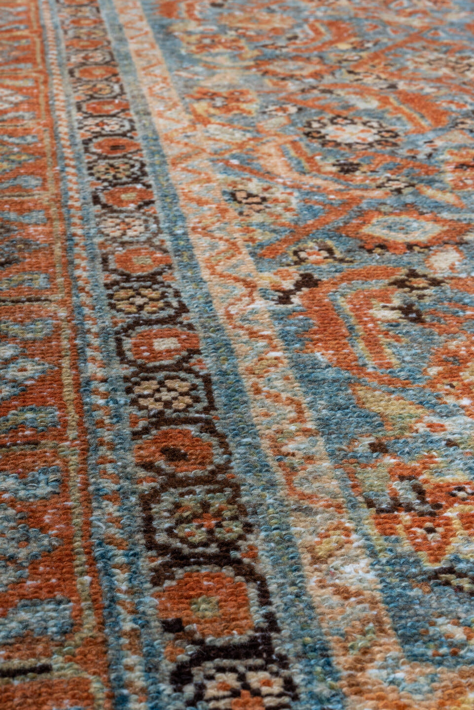 3' x 9' one-of-a-kind handmade vintage Malayer runner rug. Color palette: light blue, rust, ivory, navy, camel, charcoal
