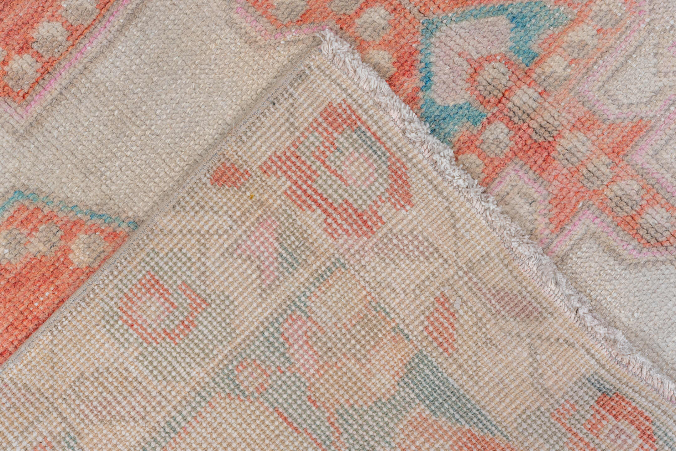4' x 7' one-of-a-kind handmade vintage Oushak rug. Color palette: ivory, coral, aqua, beige, blush, taupe, terracotta, teal