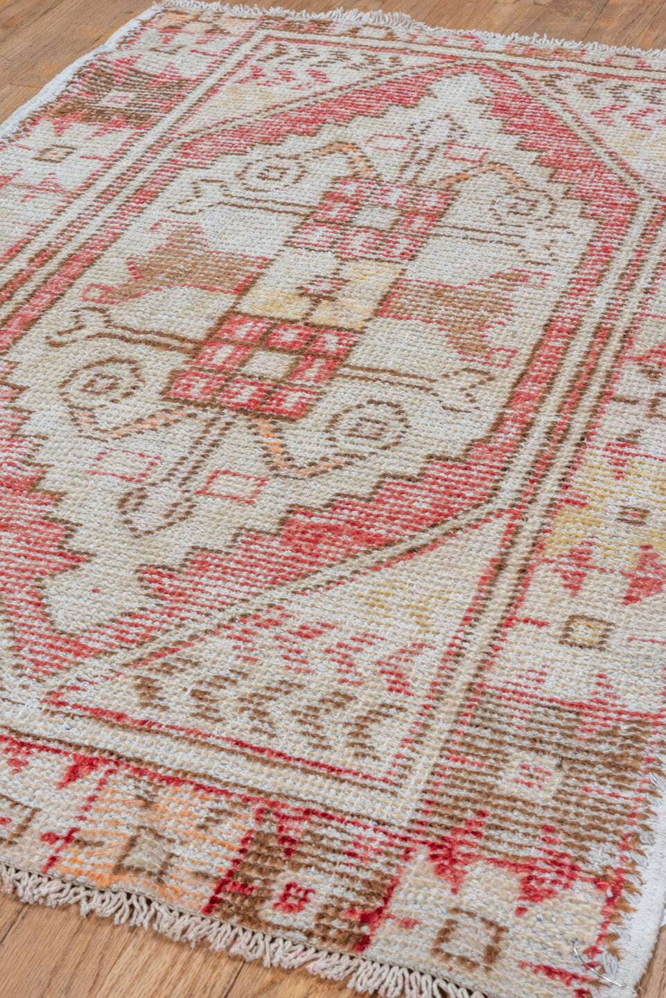 2' x 3' one-of-a-kind handmade vintage Oushak small size rug. Color palette: ivory, rose, rust, taupe, brown, gold, pink