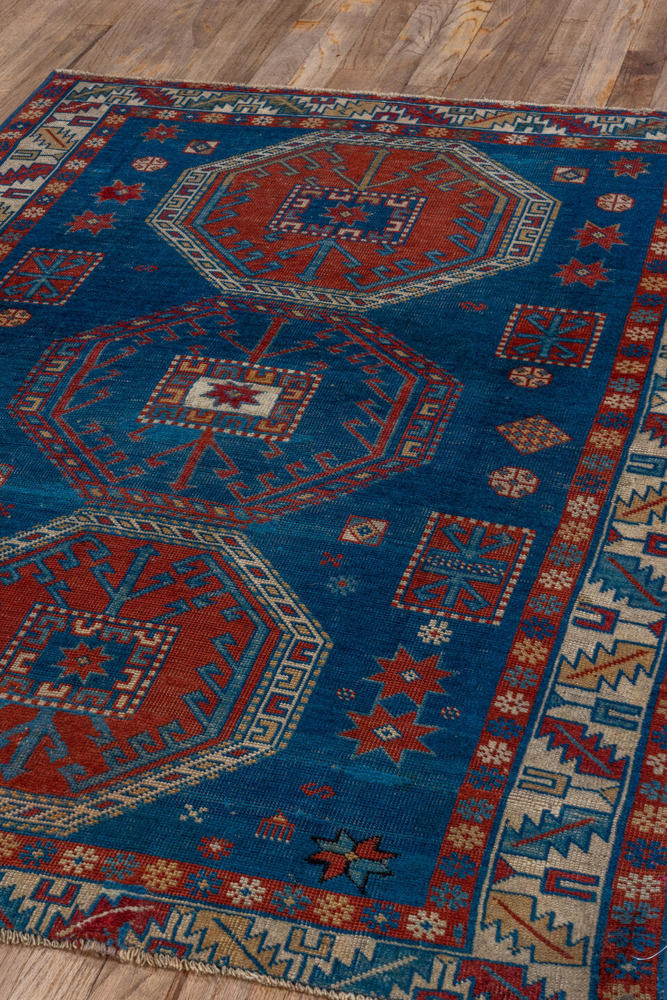 3' x 4' one-of-a-kind handmade vintage Shirvan small size rug. Color palette: blue, ivory, rust, crimson, navy, camel, teal