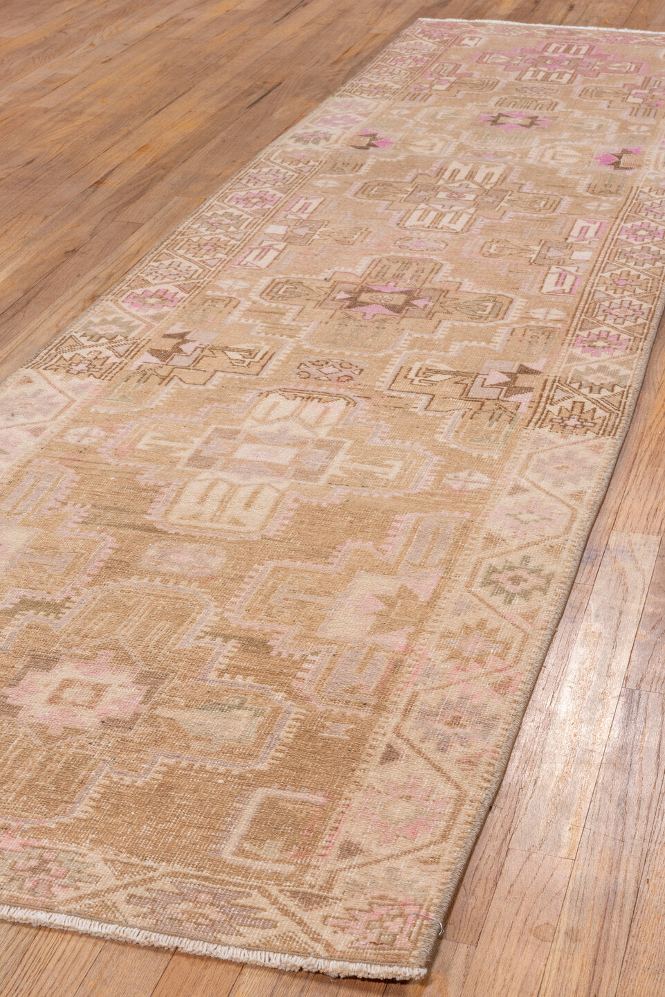 2' x 10' one-of-a-kind handmade vintage Malayer runner rug. Color palette: brown, off-white, orange, pink, snow, tan, white