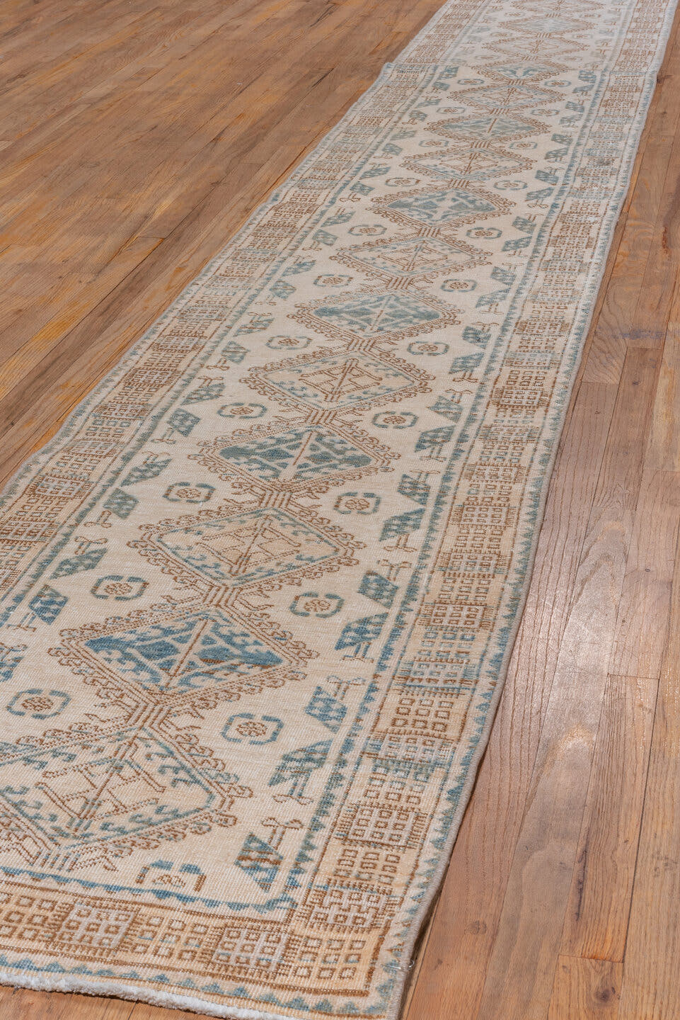2' x 14' one-of-a-kind handmade vintage Sarab runner rug. Color palette: ivory, sky_blue, camel, taupe, light_blue