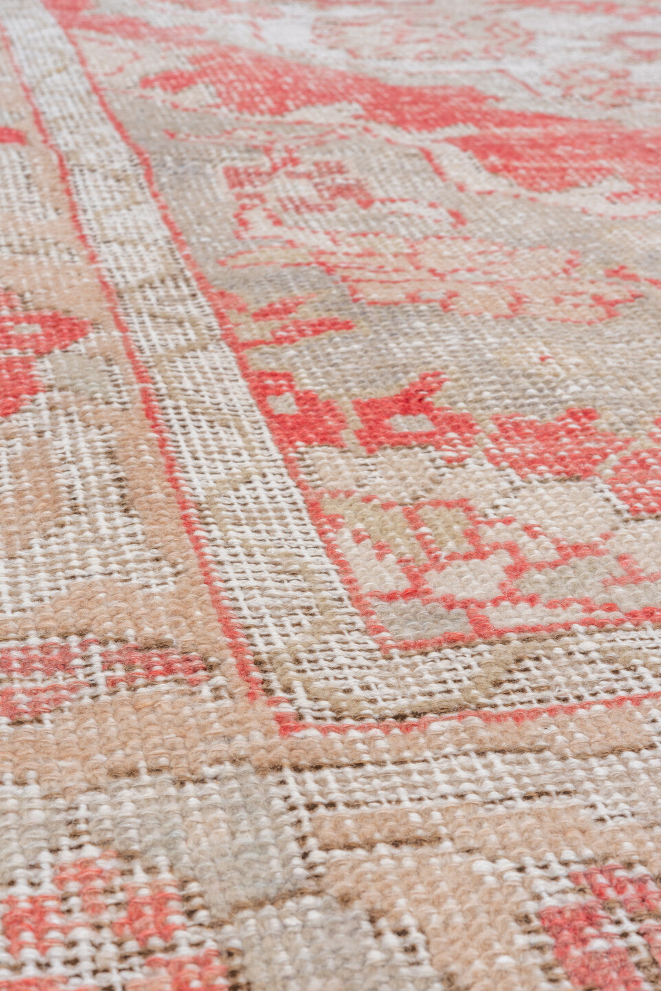 5' x 9' one-of-a-kind handmade vintage Oushak medium size rug. Color palette: gray, light gray, off-white, pink, red