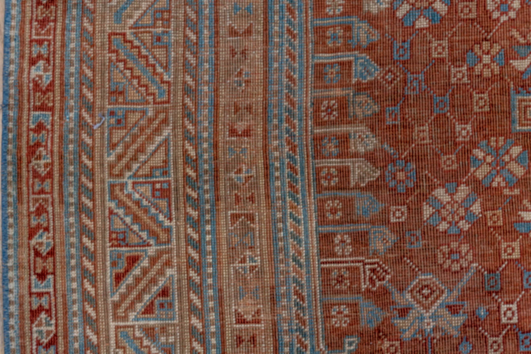 5' x 9' one-of-a-kind handmade vintage Qashqai medium size rug. Color palette: rust, sky blue, ivory, camel, taupe