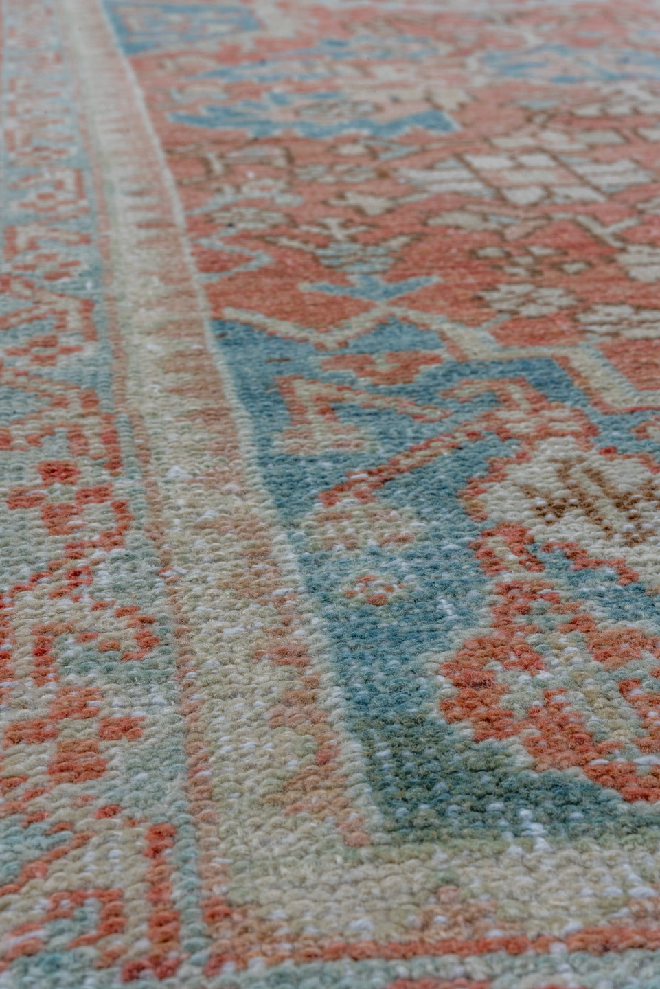2' x 10' one-of-a-kind handmade vintage Heriz runner rug. Color palette: blue, brown, gray, light gray, off-white, orange