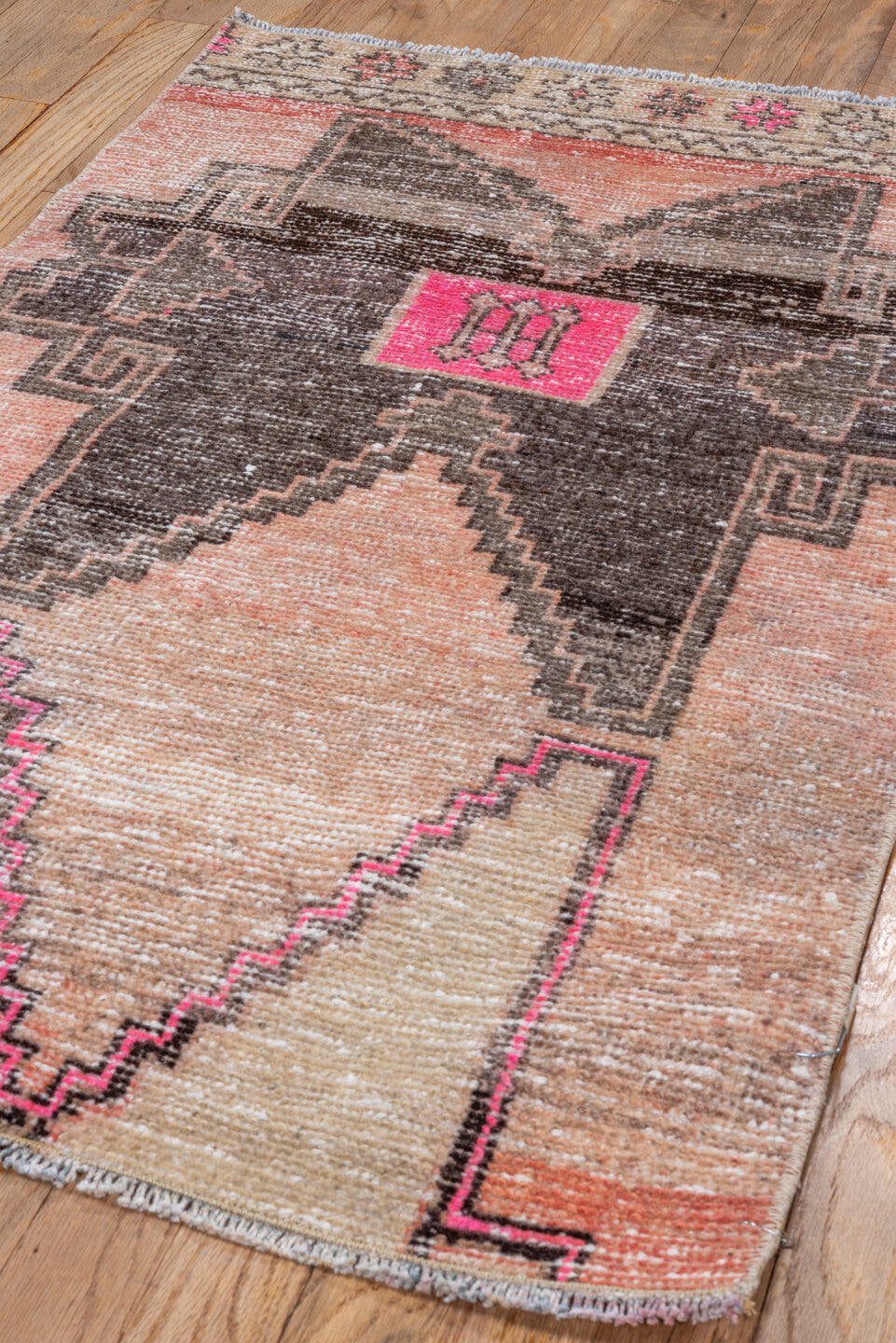 2' x 3' one-of-a-kind handmade vintage Oushak small size rug. Color palette: peach, charcoal, ivory, hot pink, taupe, coral