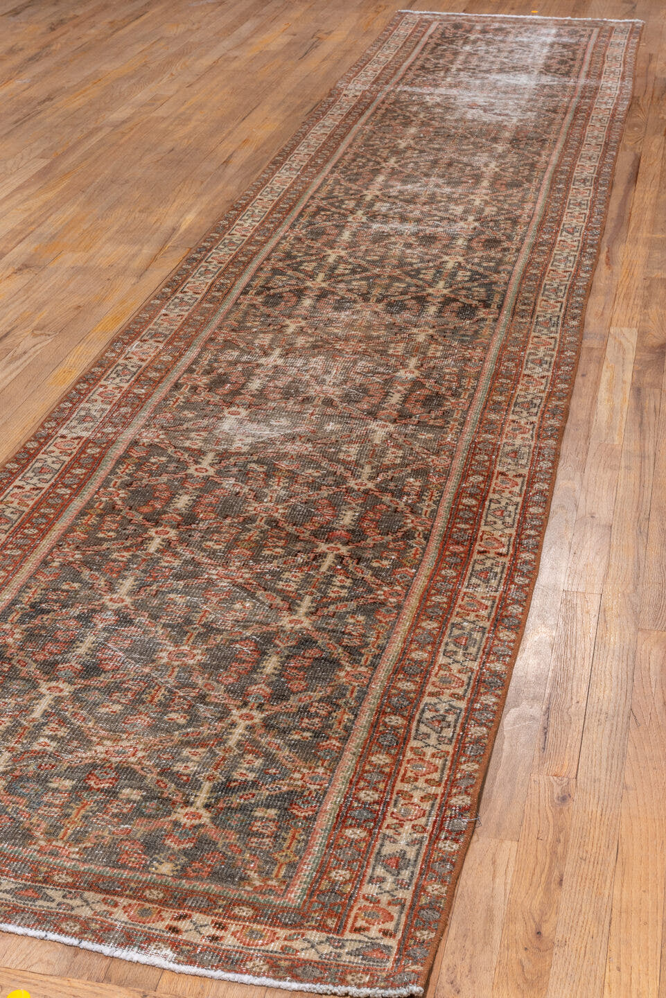 3' x 16' one-of-a-kind handmade antique Mahal runner rug. Color palette: brown, rust, ivory, charcoal, terra cotta, taupe