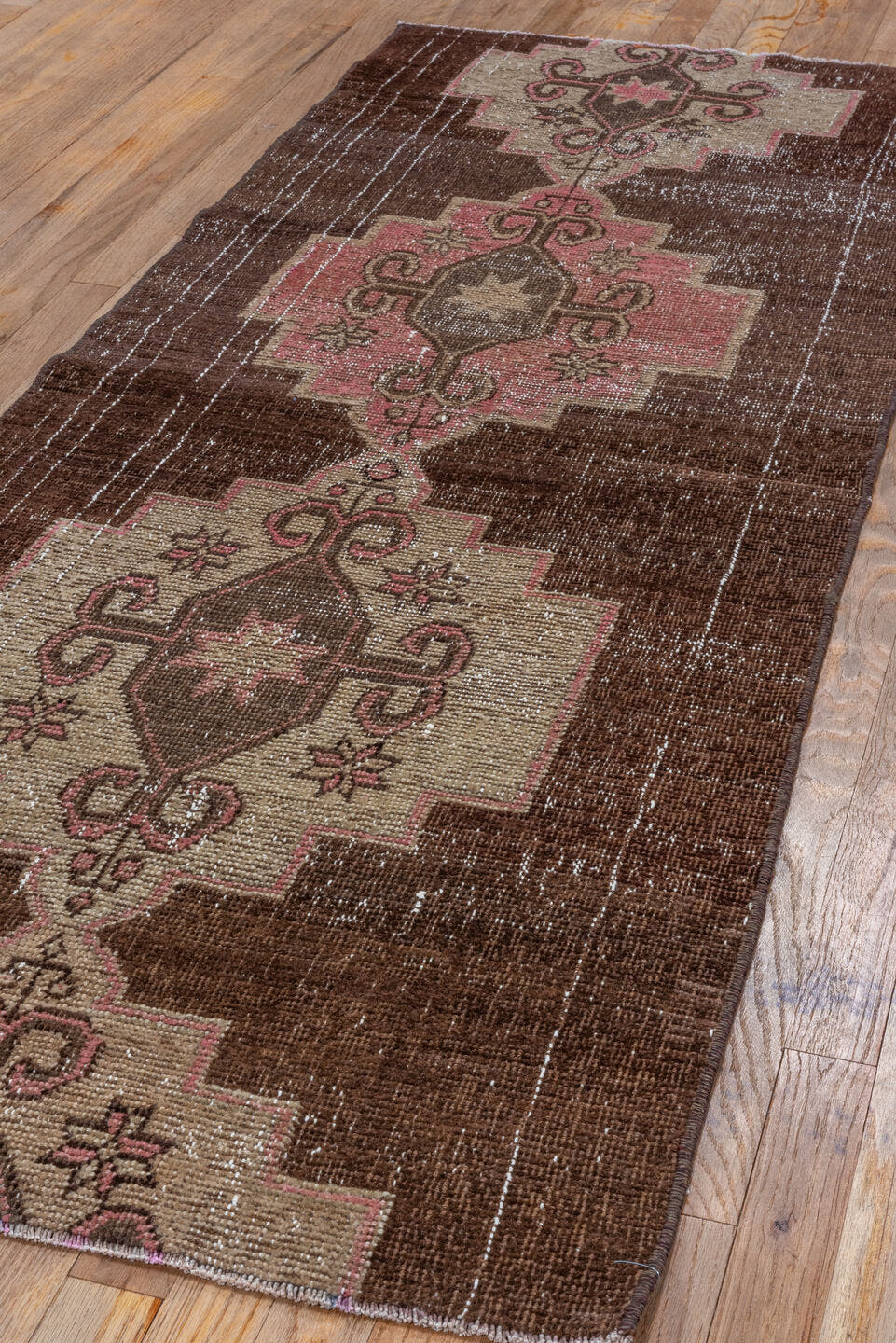 2' x 7' one-of-a-kind handmade vintage Kars runner rug. Color palette: brown, ivory, rose, taupe, dusty pink, pink, red