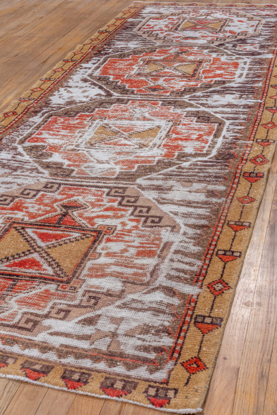 3' x 10' one-of-a-kind handmade vintage Oushak runner rug. Color palette: ivory, brown, rust, camel, terracotta, charcoal