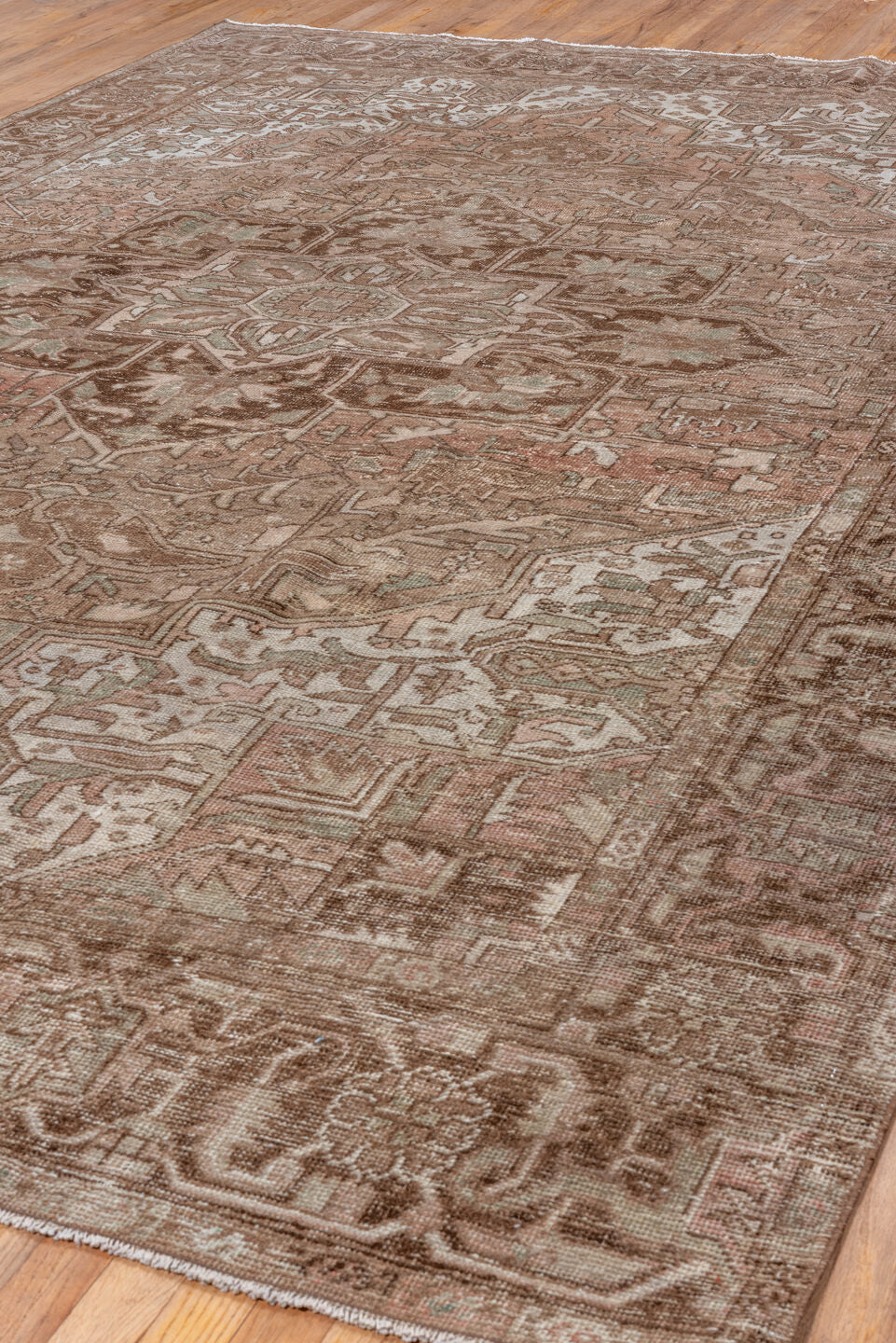 8' x 12' one-of-a-kind handmade vintage Heriz large size rug. Color palette: brown, gray, light gray, off-white, pink