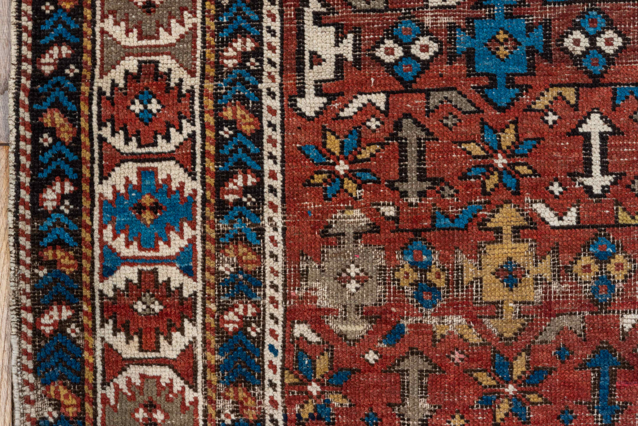 4' x 7' one-of-a-kind handmade vintage Shirvan rug. Color palette: rust, ivory, blue, camel, brown, charcoal, terracotta