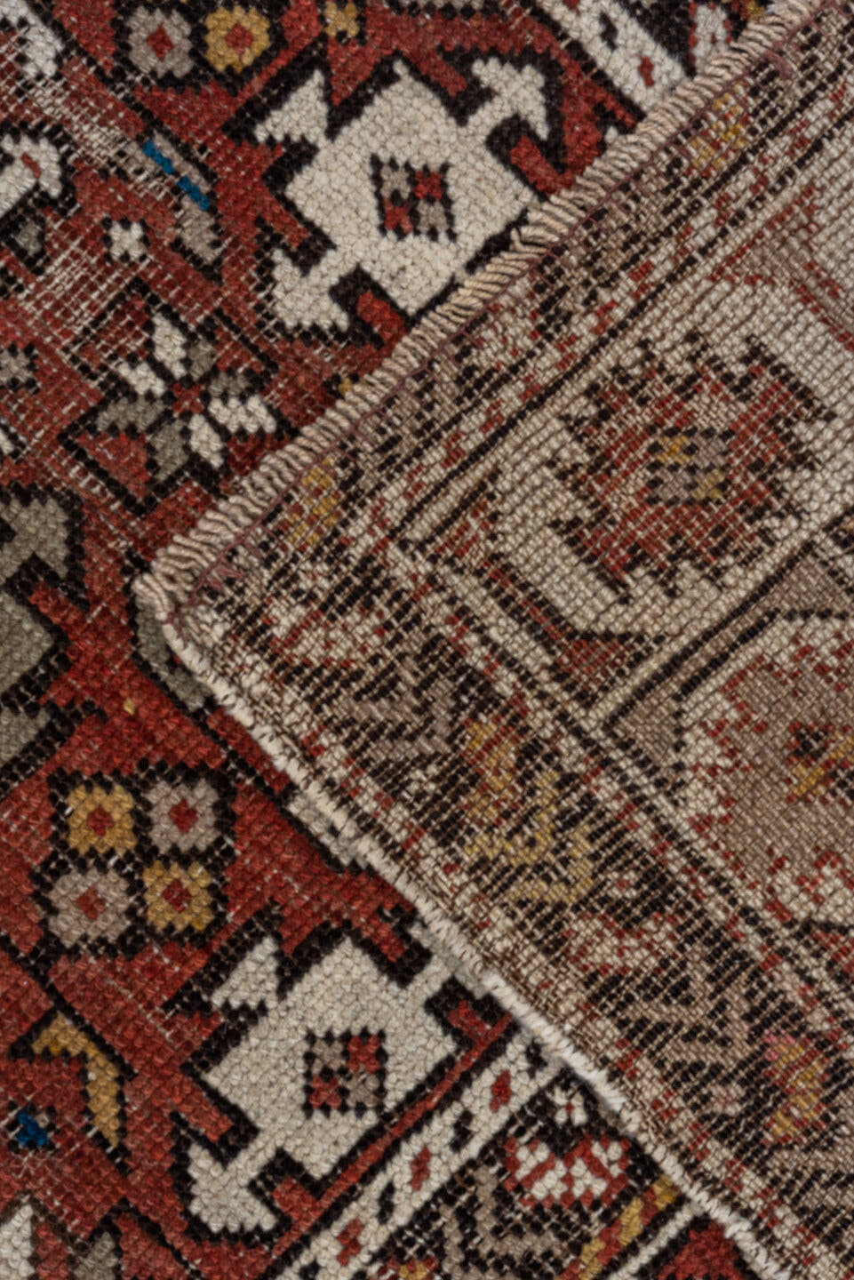 4' x 7' one-of-a-kind handmade vintage Shirvan rug. Color palette: rust, ivory, blue, camel, brown, charcoal, terracotta