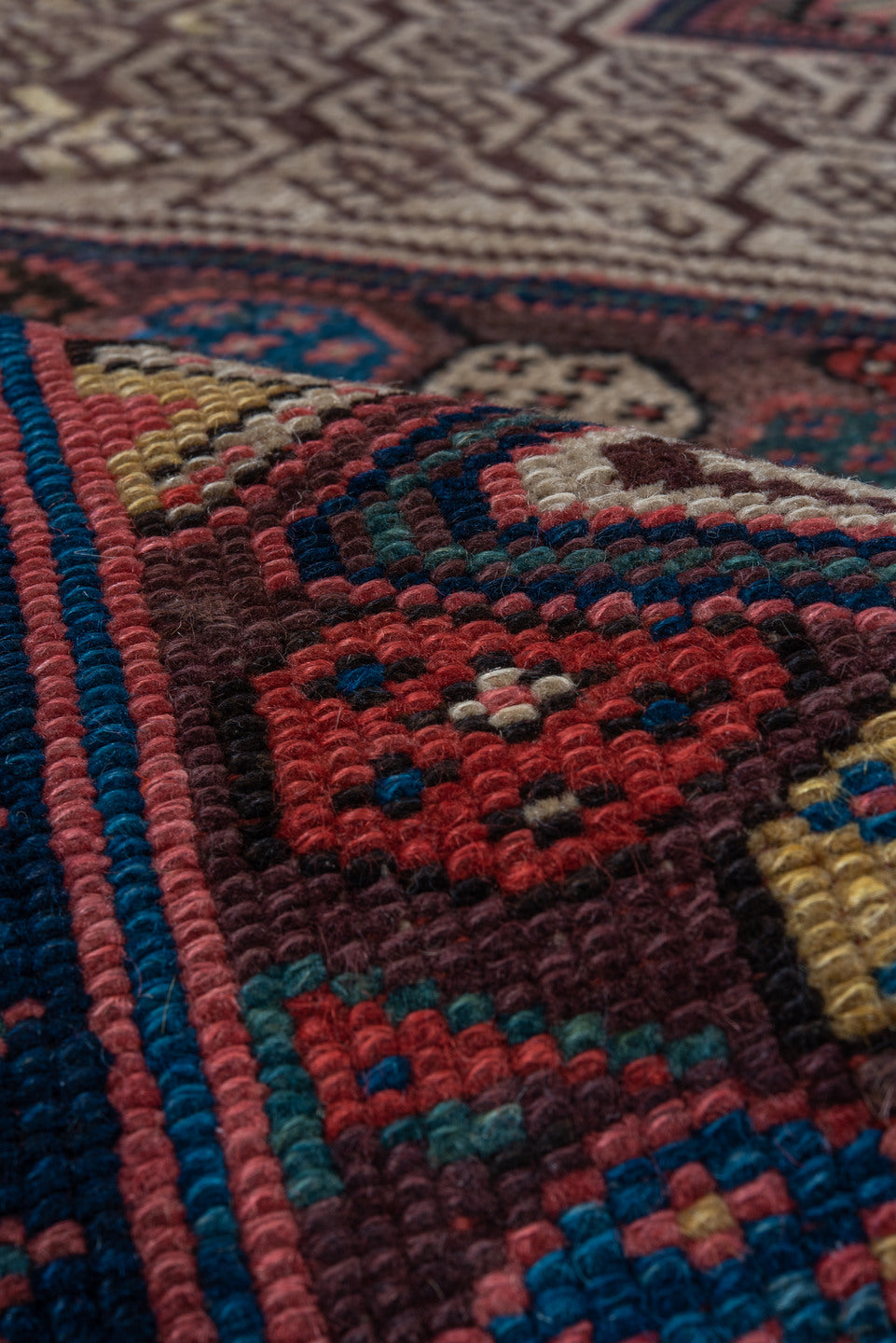 4' x 10' one-of-a-kind handmade vintage Cam Hamadan runner rug. Color palette: black, blue, brown, gray, pink, red, wine