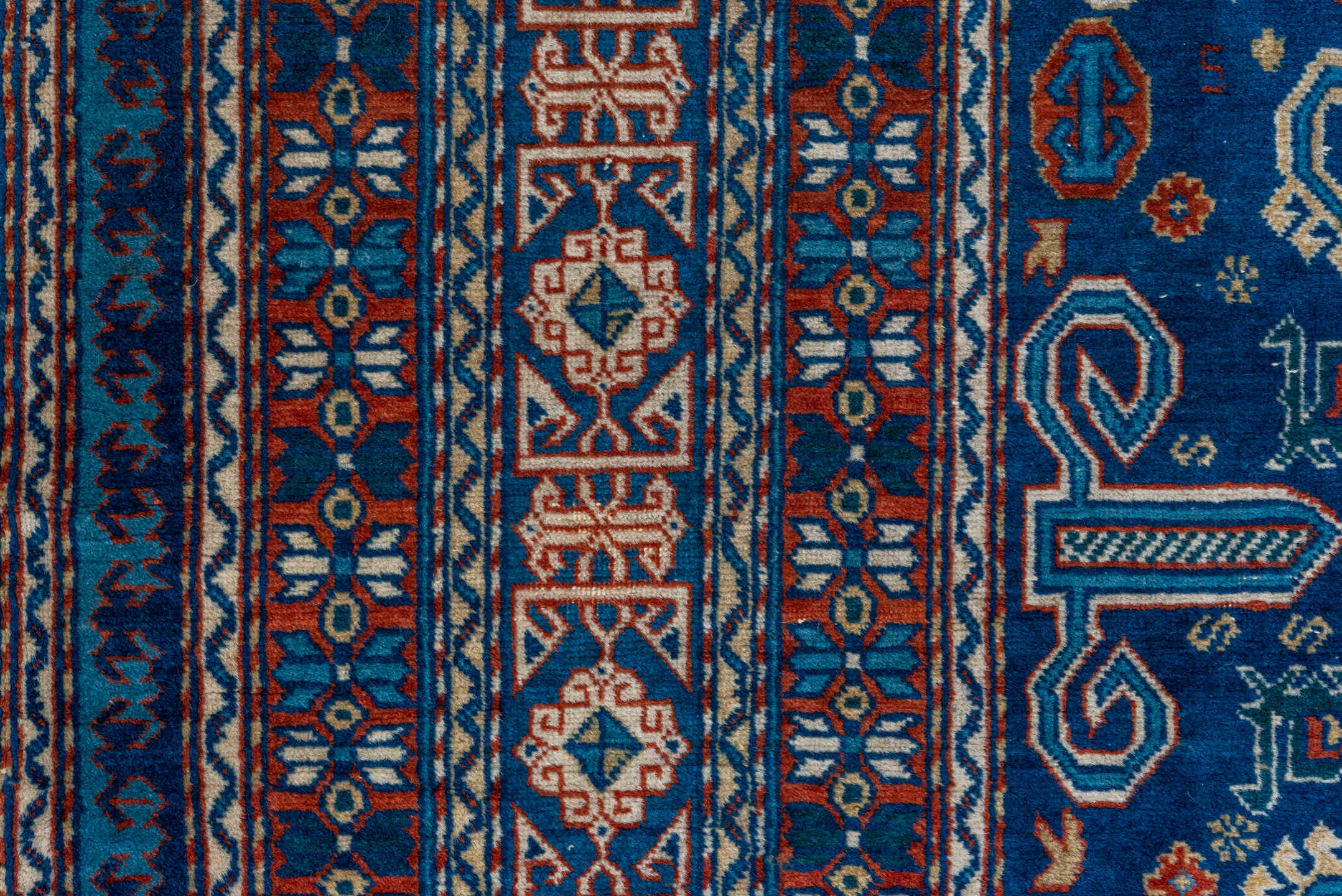 4' x 5' one-of-a-kind handmade vintage Shirvan small size rug. Color palette: navy, ivory, rust, sky_blue, crimson, camel
