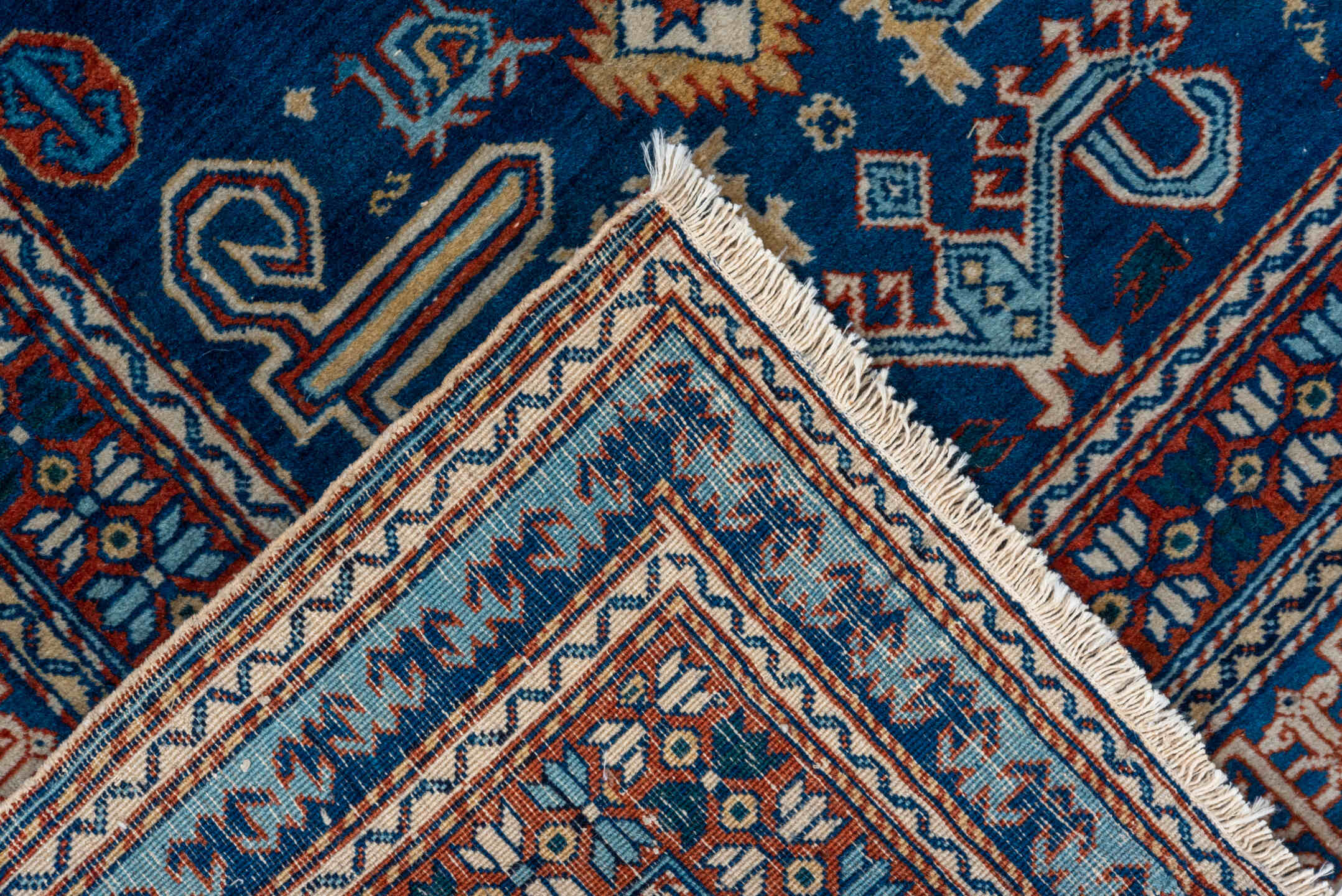 4' x 5' one-of-a-kind handmade vintage Shirvan small size rug. Color palette: navy, ivory, rust, sky_blue, crimson, camel