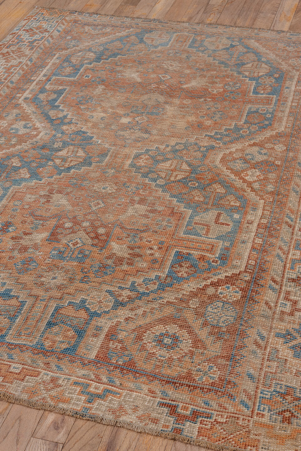 3' x 5' one-of-a-kind handmade vintage Shiraz small size rug. Color palette: terra cotta, ivory, sky blue, rust, beige