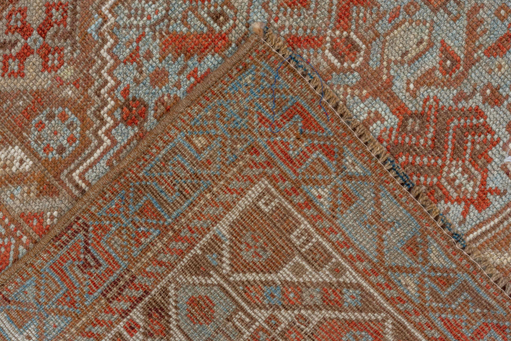 7' x 10' one-of-a-kind handmade vintage Shiraz large size rug. Color palette: rust, ivory, terra cotta, sky blue, camel