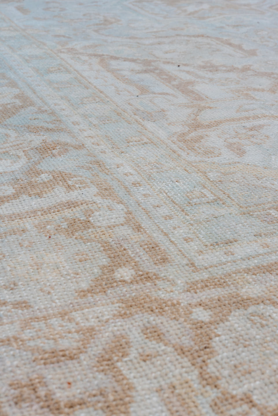 7' x 9' one-of-a-kind handmade vintage Heriz rug. Color palette: ivory, beige, taupe, camel, pale blue, gray, light blue