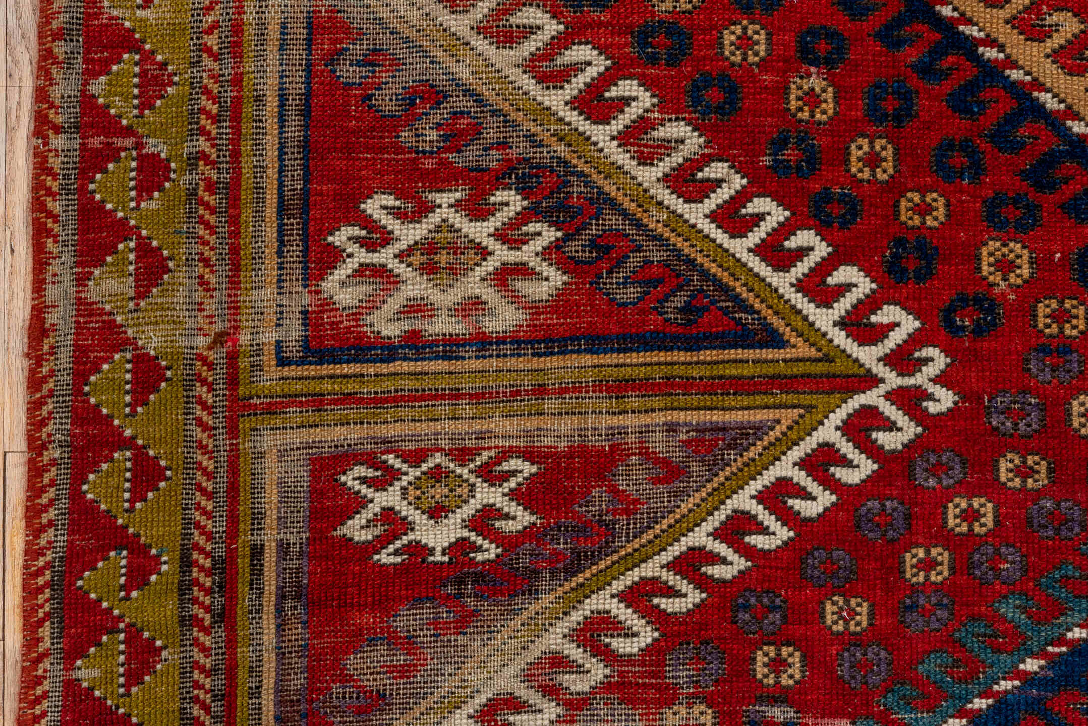 5' x 7' one-of-a-kind handmade vintage Kazak rug. Color palette: red, ivory, navy, olive, gold, rust, sky_blue, brown, blue