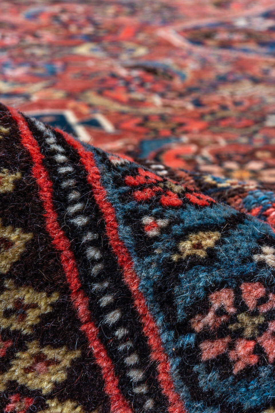 6' x 9' one-of-a-kind handmade vintage Bidjar medium size rug. Color palette: navy, rust, ivory, red, coral, blue, gold