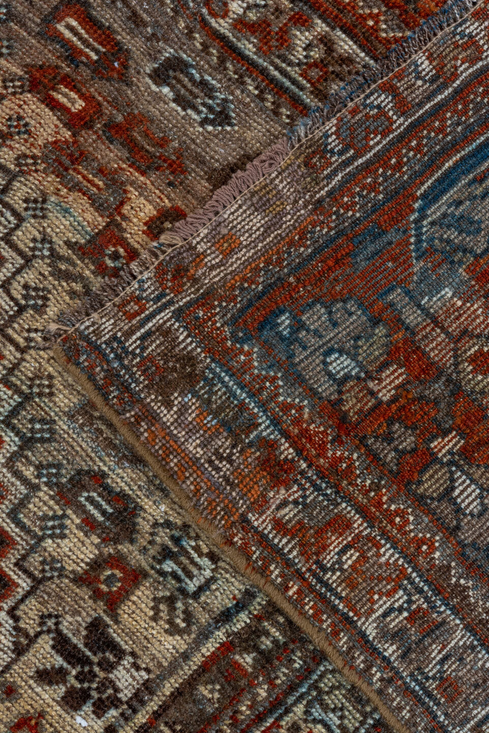 7' x 9' one-of-a-kind handmade vintage Shiraz rug. Color palette: rust, ivory, charcoal, slate, terracotta, brown, sky_blue