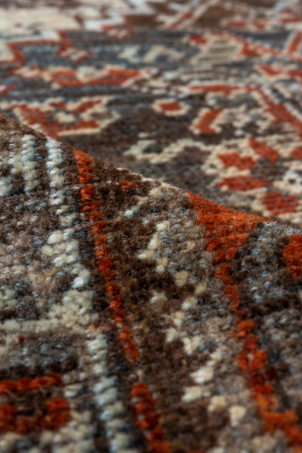 7' x 9' one-of-a-kind handmade vintage Shiraz rug. Color palette: rust, ivory, charcoal, slate, terracotta, brown, sky_blue