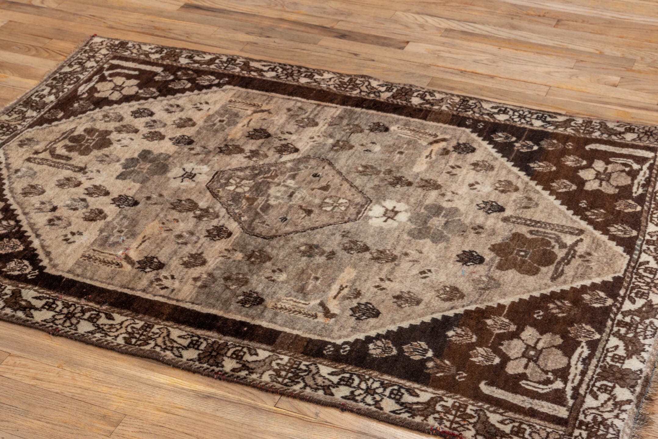 3' x 5' one-of-a-kind handmade vintage Gabbe small size rug. Color palette: ivory, taupe, brown, charcoal, camel, beige