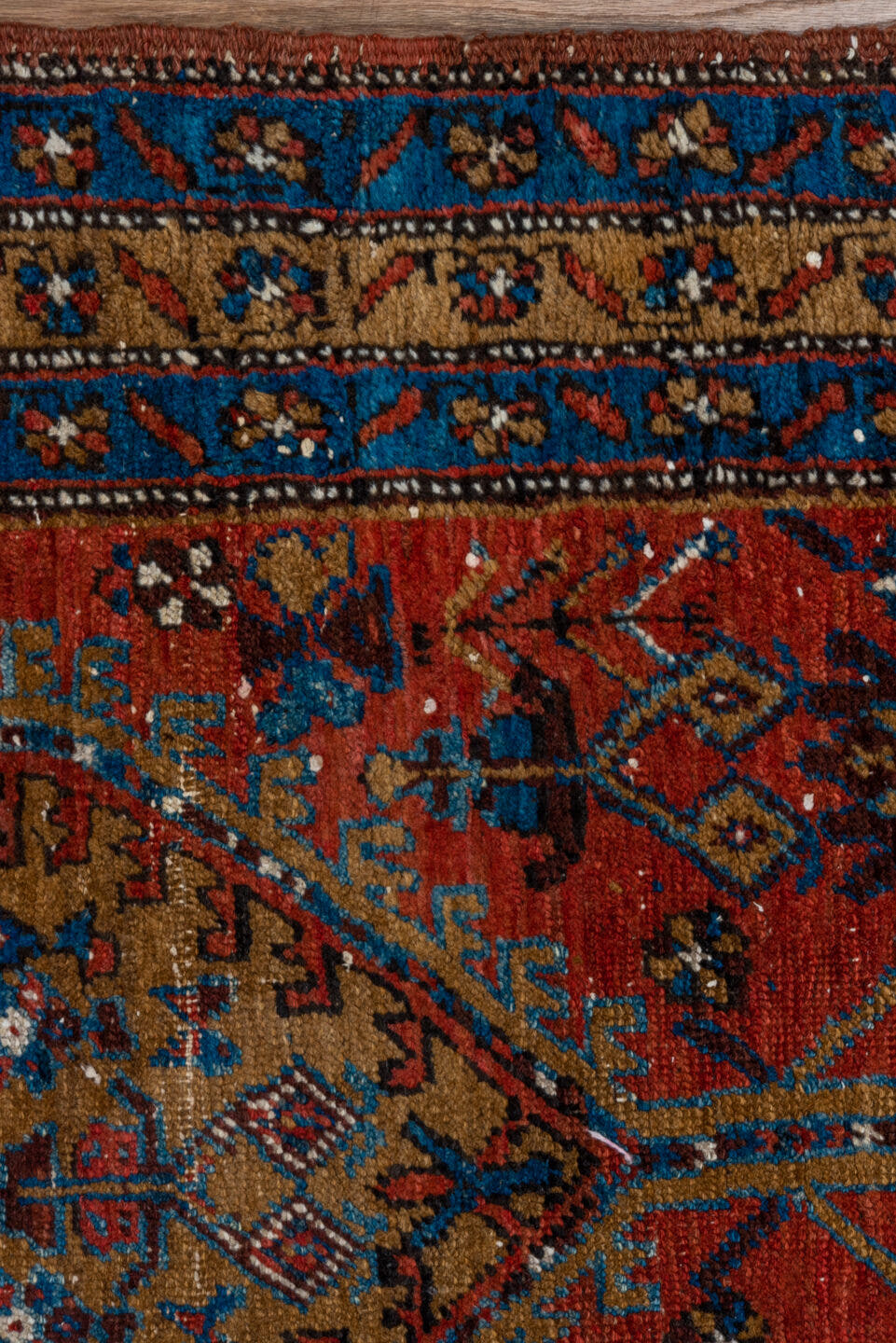3' x 13' one-of-a-kind handmade vintage Heriz runner rug. Color palette: rust, navy, sky blue, camel, ivory, terracotta
