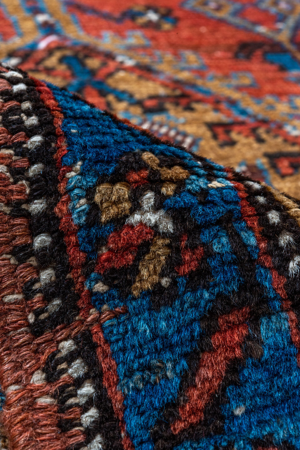 3' x 13' one-of-a-kind handmade vintage Heriz runner rug. Color palette: blue, brown, gray, maroon, pink, red