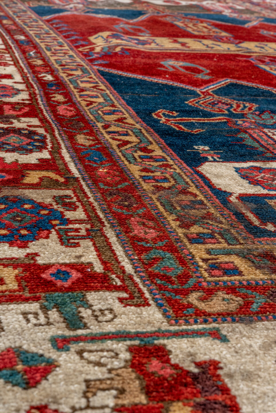 4' x 7' one-of-a-kind handmade antique Malayer rug. Color palette: crimson, navy, ivory, burgundy, camel, cobalt, taupe, red