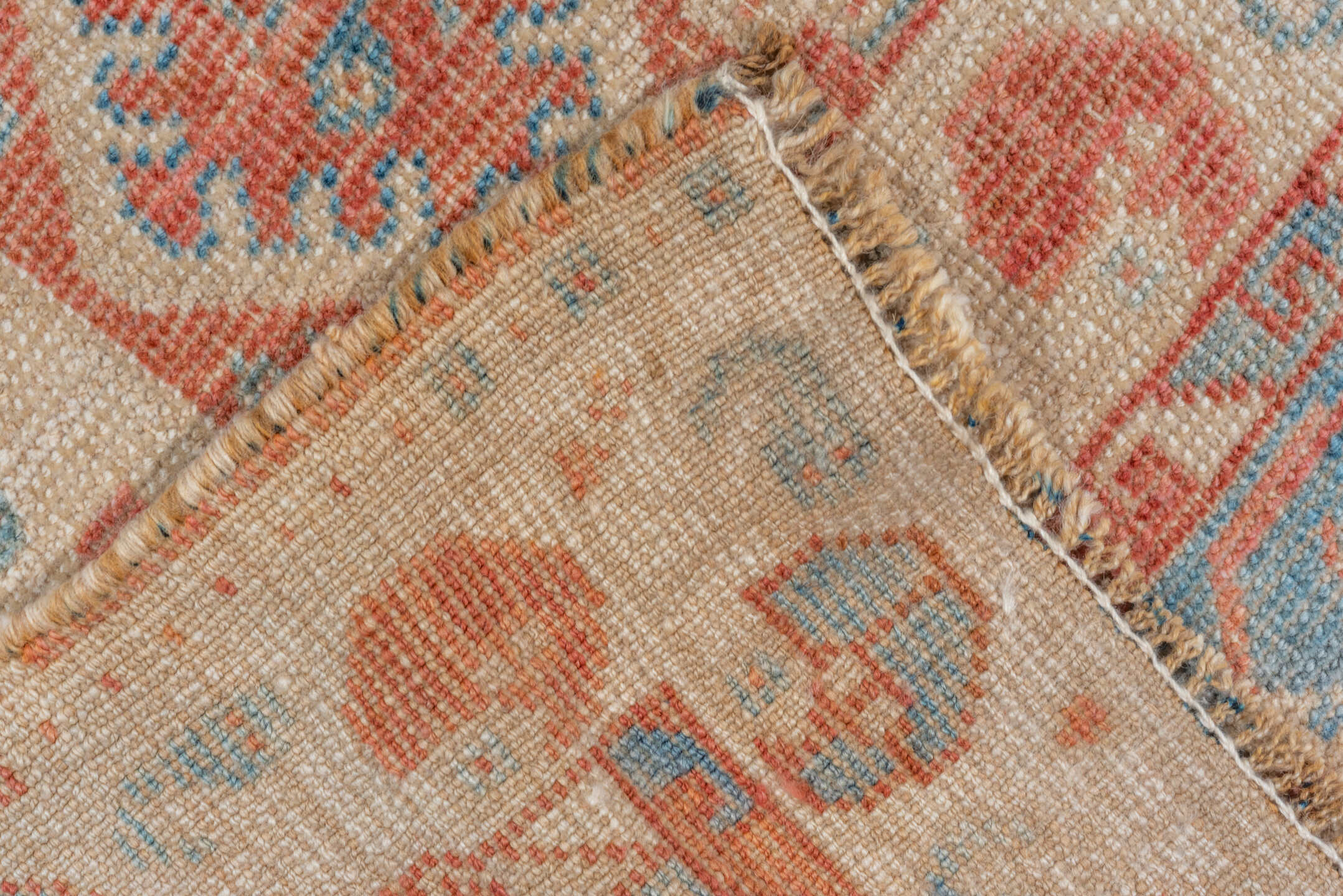 7' x 9' one-of-a-kind handmade vintage Shiraz rug. Color palette: terra cotta, ivory, sky blue, rust, beige, slate