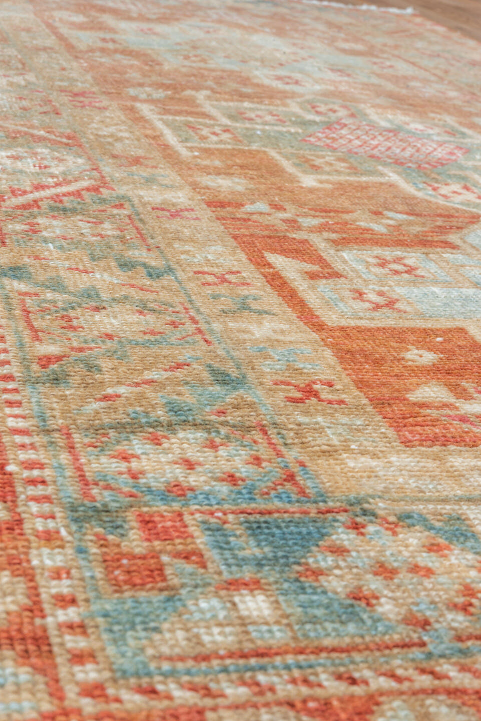 3' x 5' one-of-a-kind handmade vintage Heriz small size rug. Color palette: terra cotta, ivory, pale blue, rust, camel, sage