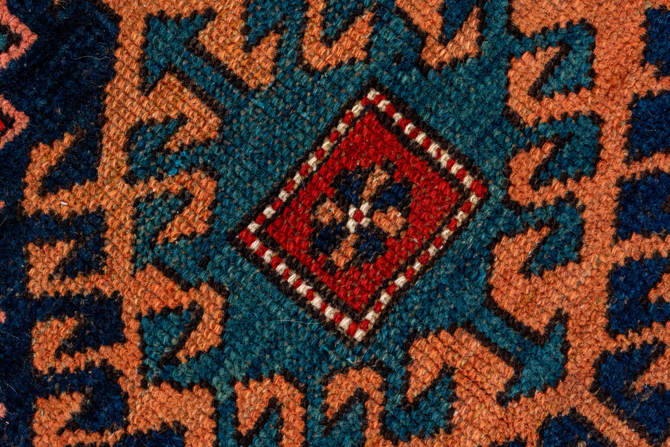 3' x 12' one-of-a-kind handmade vintage Heriz runner rug. Color palette: rust, navy, terra cotta, camel, ivory, teal, rose