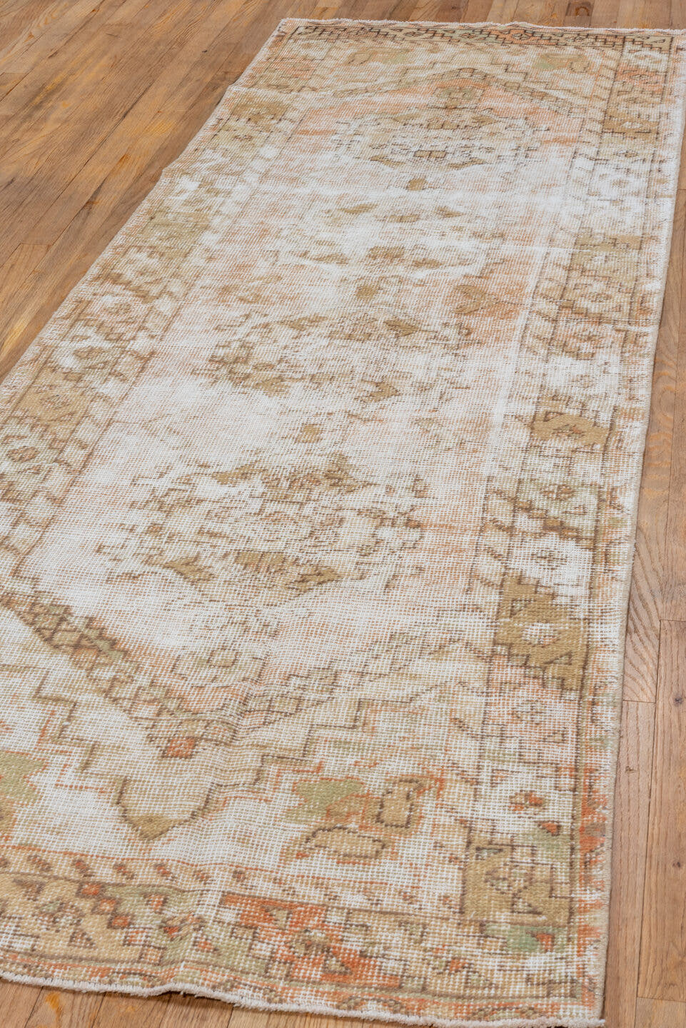 3' x 9' one-of-a-kind handmade vintage Oushak runner rug. Color palette: ivory, blush, taupe, beige, camel, sage