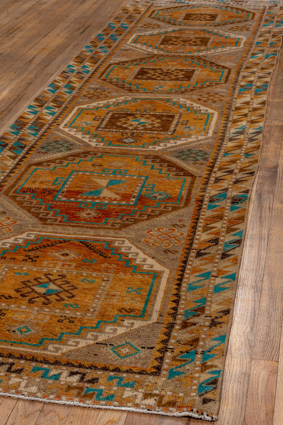 3' x 12' one-of-a-kind handmade vintage Oushak runner rug. Color palette: camel, rust, brown, ivory, turquoise, taupe, beige