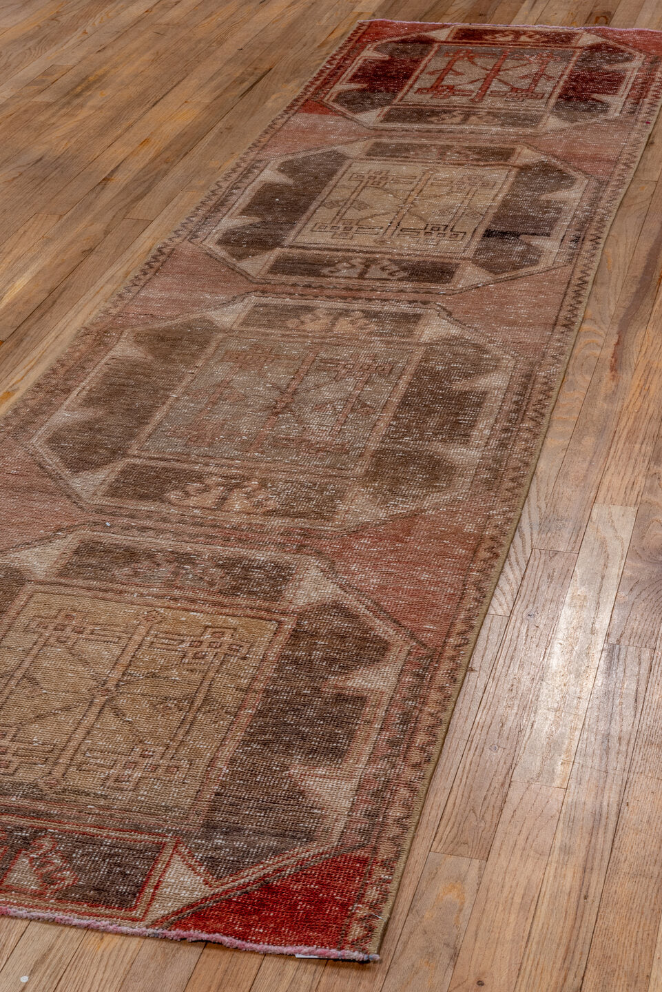 2' x 9' one-of-a-kind handmade vintage Oushak runner rug. Color palette: brown, gray, light gray, off-white, pink, red, snow
