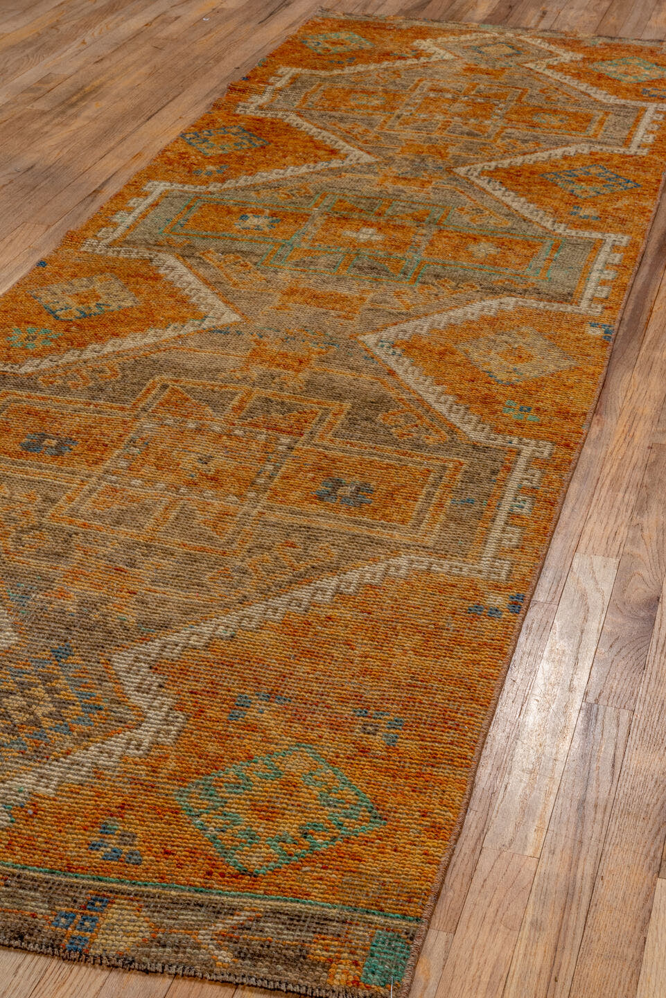 3' x 10' one-of-a-kind handmade vintage Oushak runner rug. Color palette: terra cotta, taupe, camel, aqua, ivory, slate