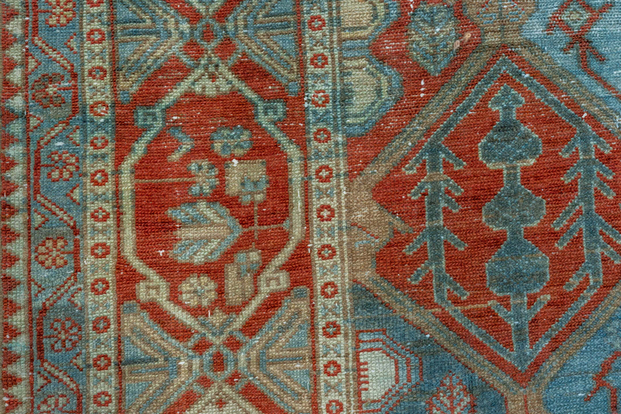 5' x 10' one-of-a-kind handmade vintage Baktiary runner rug. Color palette: rust, sky blue, ivory, camel, teal, terra cotta