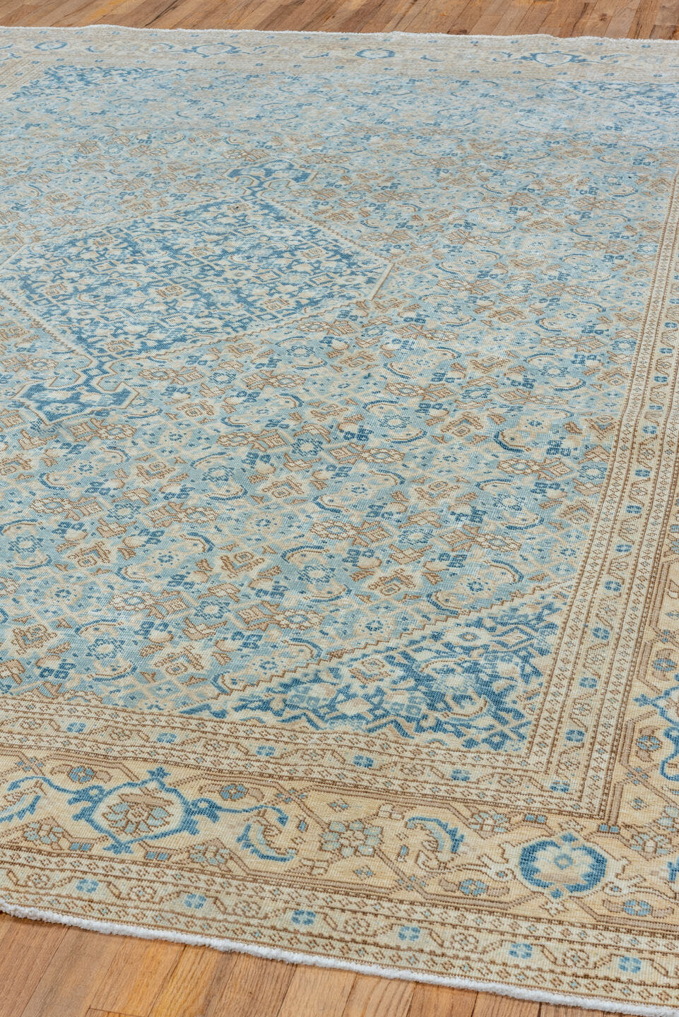 7' x 10' one-of-a-kind handmade vintage Tabriz large size rug. Color palette: ivory, sky blue, beige, tan, slate, camel