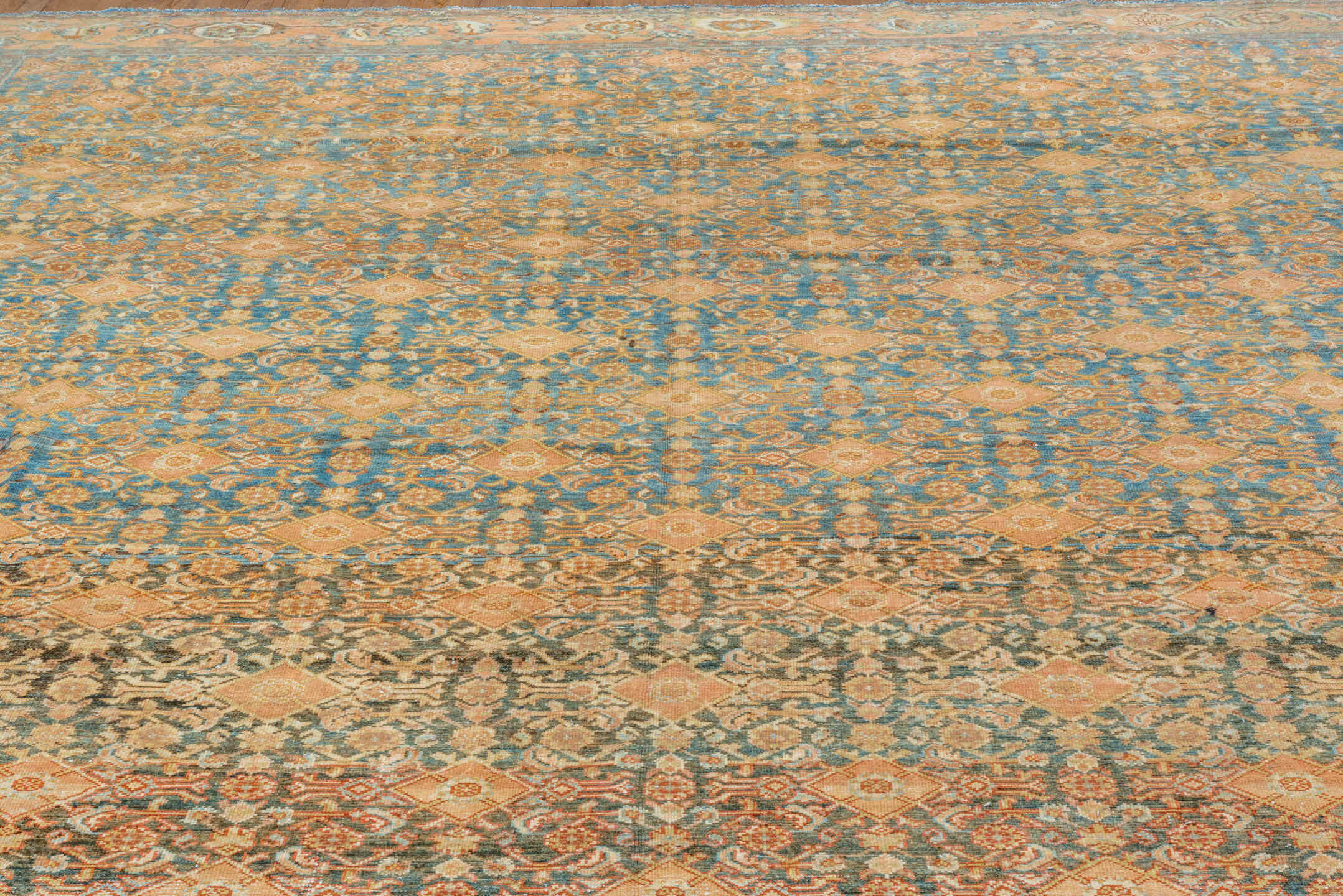 11' x 20' one-of-a-kind handmade vintage Malayer oversize rug. Color palette: blue, camel, ivory, taupe, brown, peach, teal