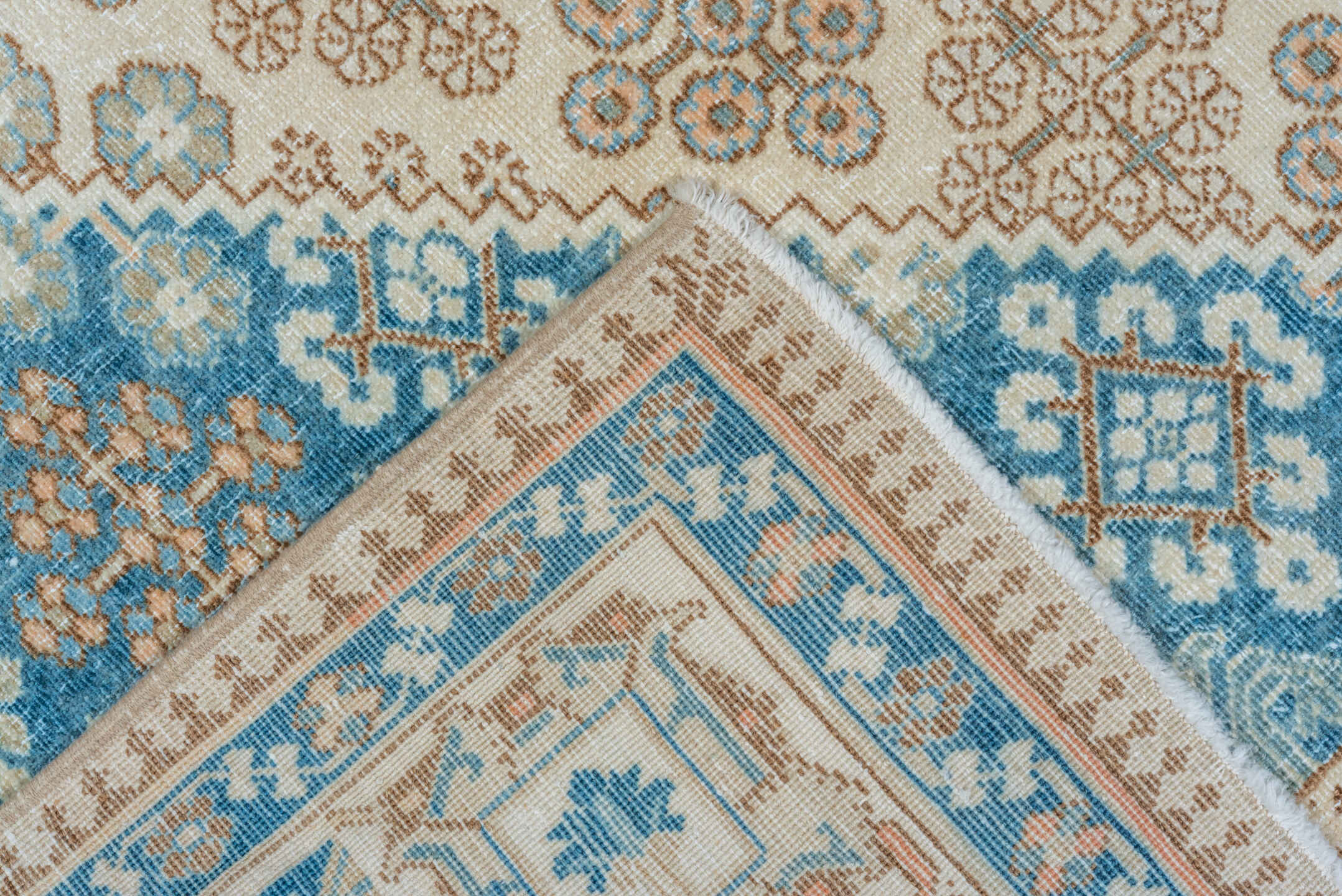7' x 11' one-of-a-kind handmade vintage Joshegan large size rug. Color palette: ivory, sky blue, taupe, beige, camel