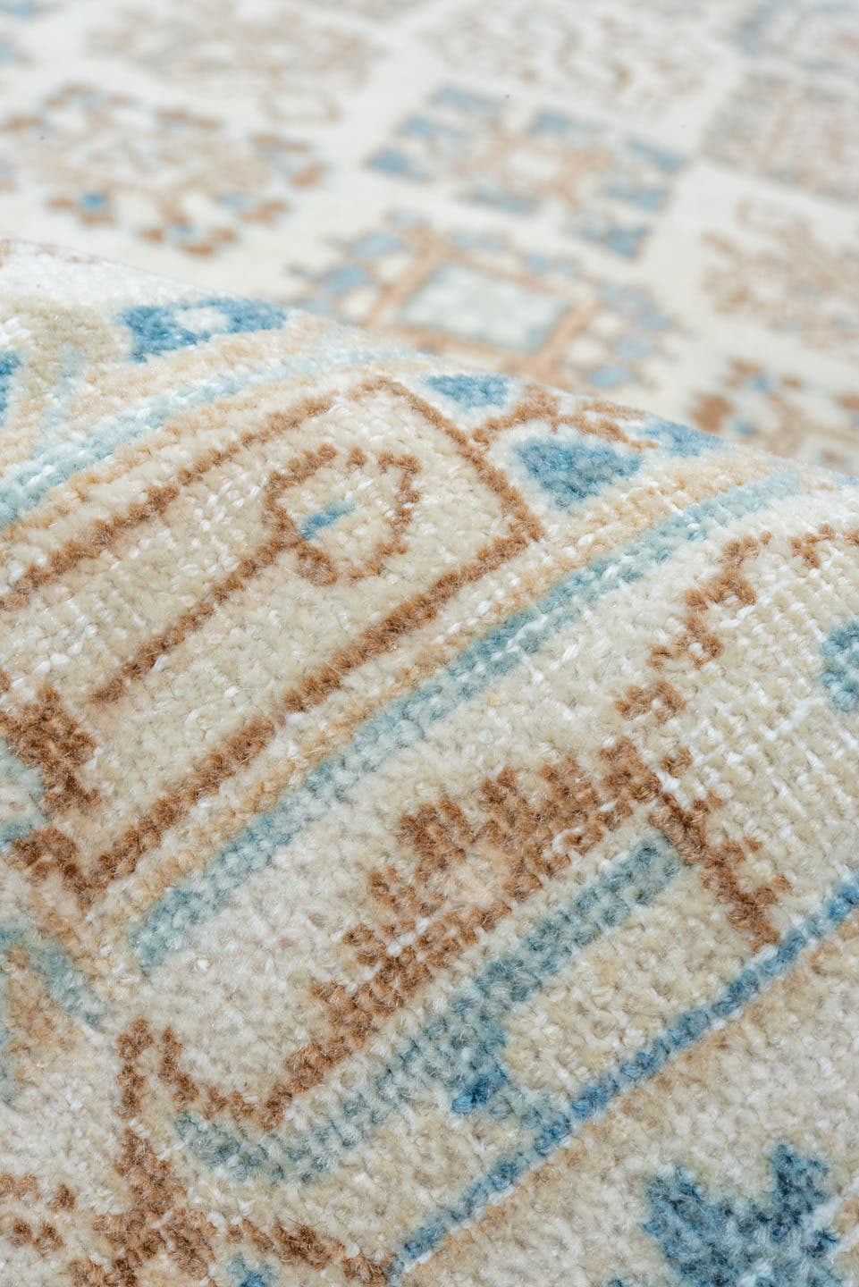7' x 11' one-of-a-kind handmade vintage Joshegan large size rug. Color palette: ivory, sky blue, taupe, beige, camel