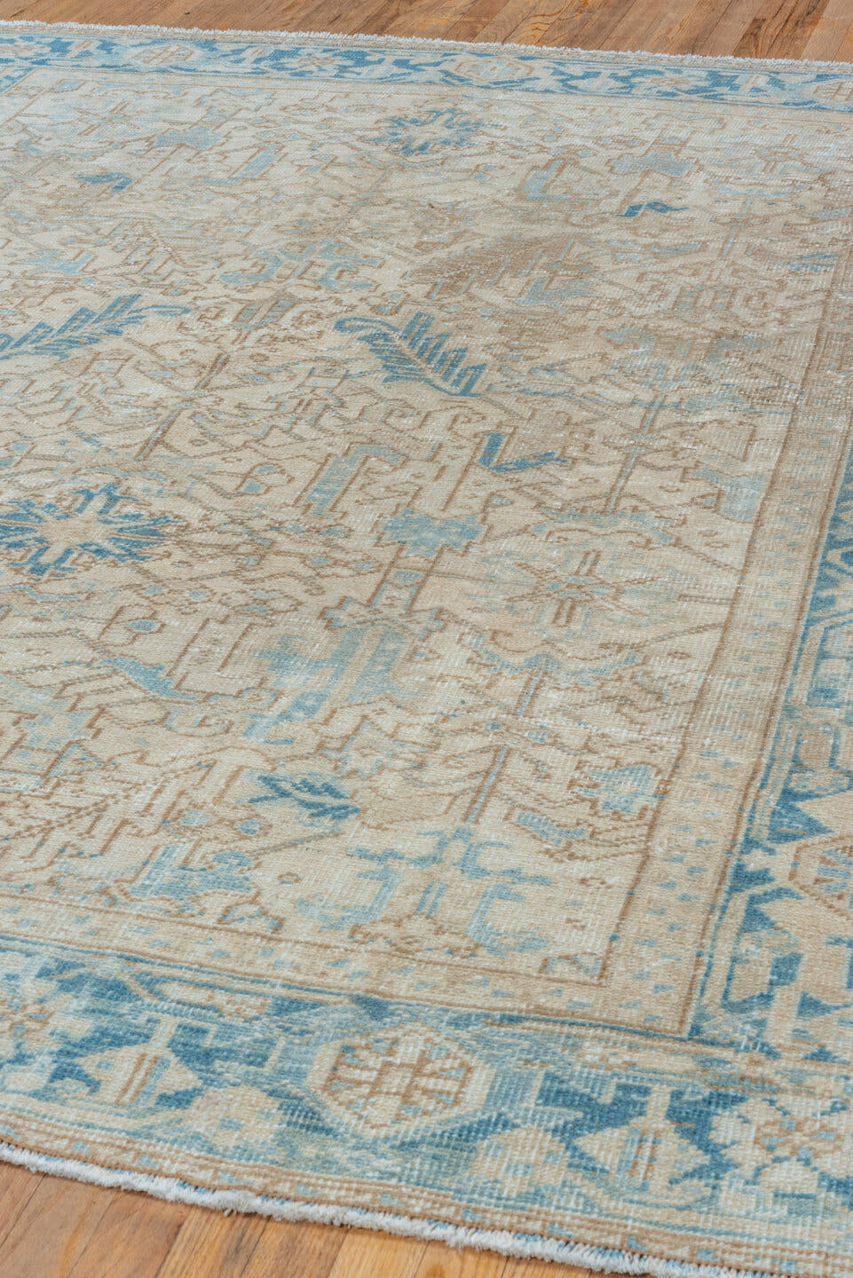 7' x 8' one-of-a-kind handmade vintage Heriz rug. Color palette: ivory, sky blue, beige, taupe, camel, slate, light blue